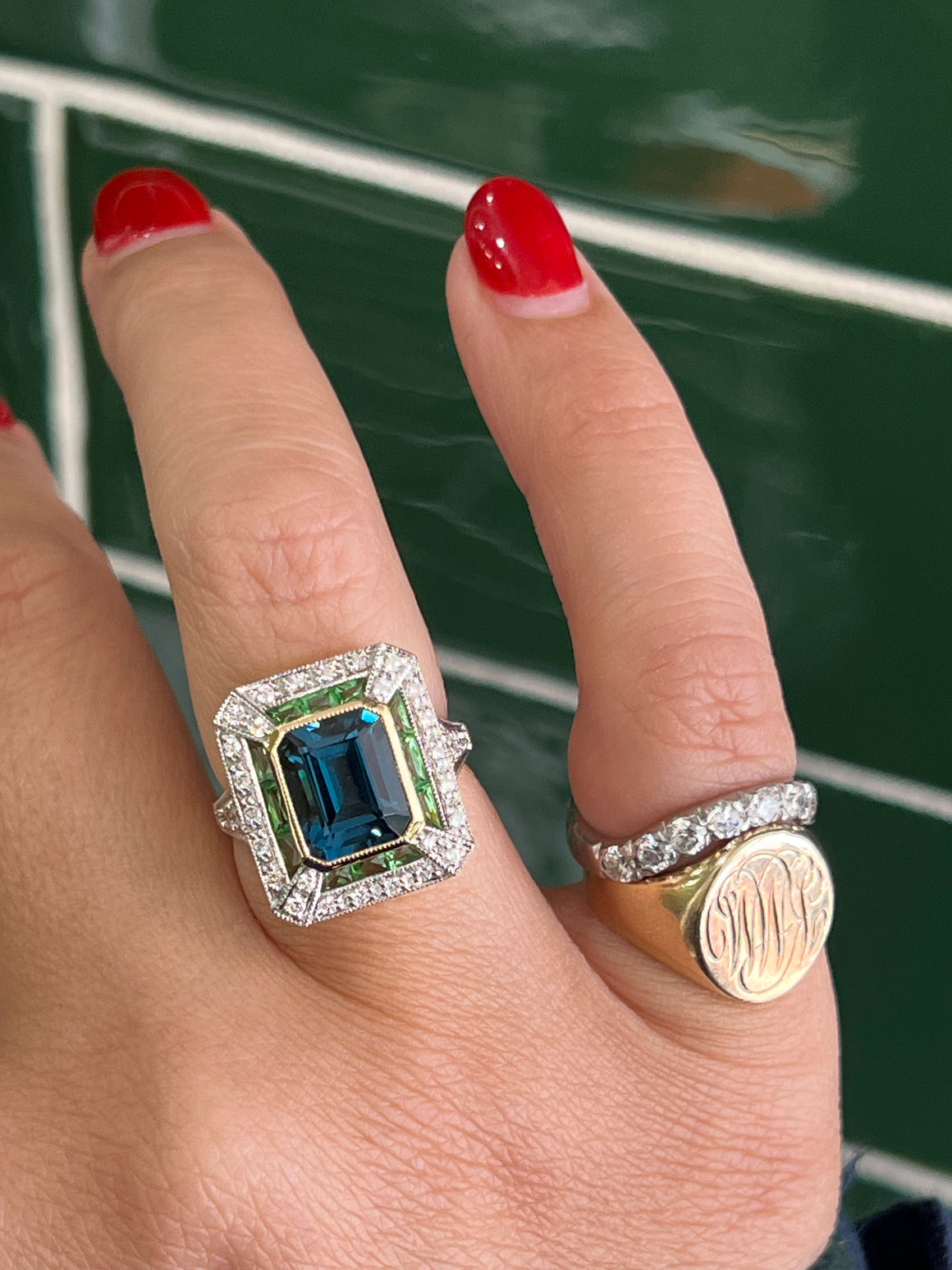 London Blue Topaz, Tsavorite Garnets and Diamonds in 18ct Yellow Gold.