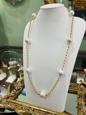 Seven Pearl Necklace in 9ct yellow gold